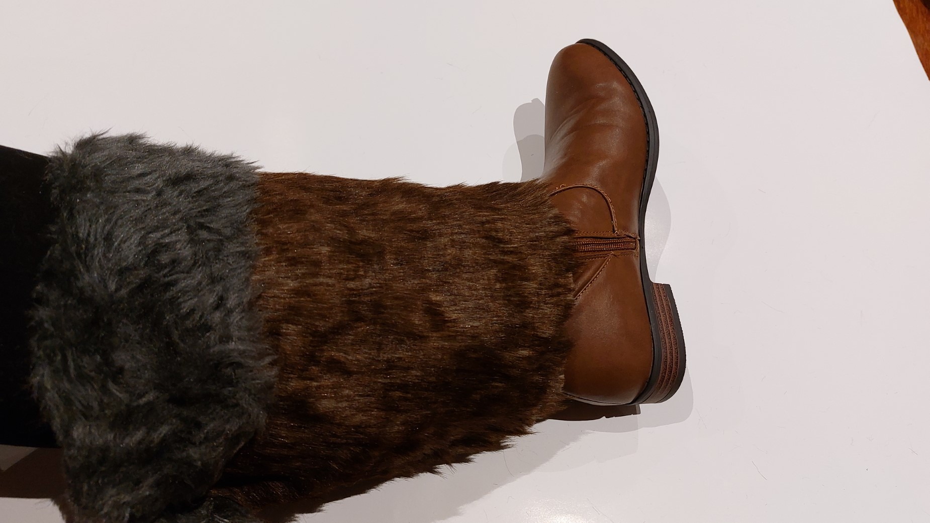 Base of the fur on top of the boots