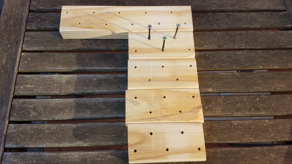 Wood pieces with drilled holes
