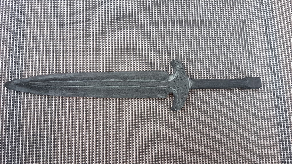 Other side of the shaped dagger