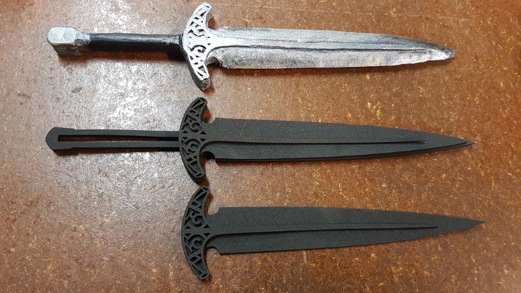 Comparison of the laser cut parts and the first completed dagger